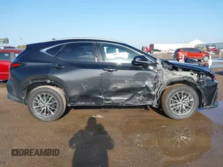2023 Lexus NX 350h with VIN 2T2AKCEZ4PC010808, listed as a IAAI auction lot 41073898 with 30,815 mi miles and . Bid and sale history available at DreamBid. Image 13.