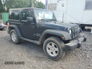 2012 Jeep Wrangler Sport with VIN 1C4AJWAG6CL256792, listed as a Copart auction lot 62634515 with 137,507 mi miles and Salvage title. Bid and sale history available at DreamBid. Image 4.