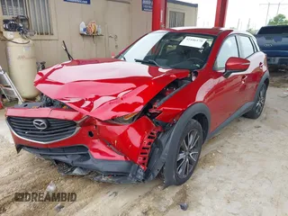 2017 Mazda CX-3 Touring z VIN JM1DKFC78H0153678, wystawiony jako IAAI lot #42446170 z przebiegiem 111 436 mil mil oraz . Historia ofert i sprzedaży dostępna na DreamBid. Obrazek 2.