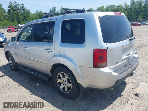 2010 Honda Pilot Touring z VIN 5FNYF4H94AB010058, wystawiony jako IAAI lot #42495313 z przebiegiem 157 306 mil mil oraz . Historia ofert i sprzedaży dostępna na DreamBid. Obrazek 3.