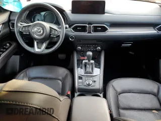 2021 Mazda CX-5 Signature with VIN JM3KFBEY2M0351720, listed as a Copart auction lot 79309063 with 21,349 mi miles and Salvage Title. Bid and sale history available at carsss.com. Image 8.