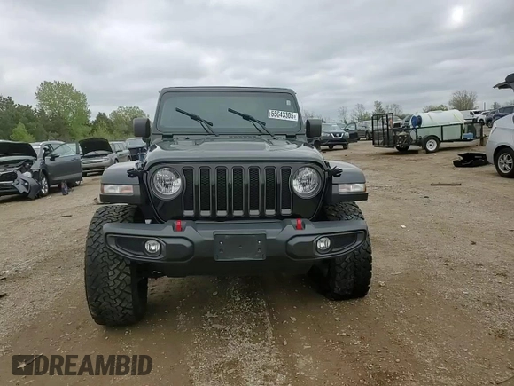 2021 Jeep Wrangler Unlimited Rubicon z VIN 1C4HJXFN1MW793064, wystawiony jako Copart lot #55643305 z przebiegiem 51 944 mil mil oraz Szkoda całkowita • Salvage title. Historia ofert i sprzedaży dostępna na DreamBid. Obrazek 13.