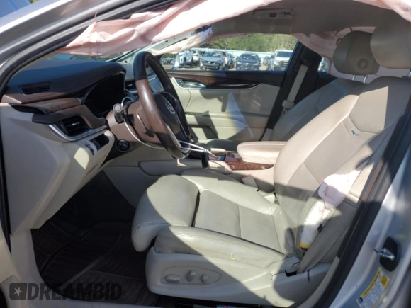2013 Cadillac XTS Luxury with VIN 2G61P5S34D9100119, listed as a Copart auction lot 52525975 with 153,977 mi miles and Clean Title. Bid and sale history available at carsss.com. Image 7.