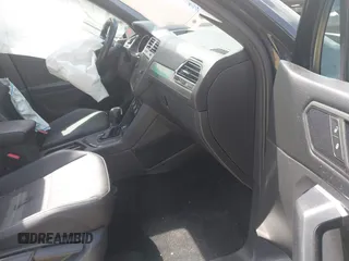 2021 Volkswagen Tiguan SE z VIN 3VV3B7AX5MM027369, wystawiony jako IAAI lot #42082821 z przebiegiem 74 024 mil mil oraz . Historia ofert i sprzedaży dostępna na DreamBid. Obrazek 5.
