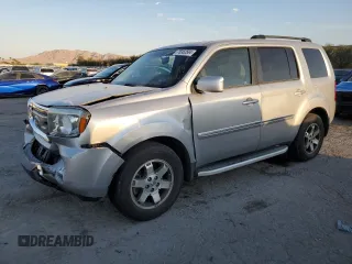 2011 Honda Pilot Touring z VIN 5FNYF3H90BB026043, wystawiony jako Copart lot #75352584 z przebiegiem 111 963 mil mil oraz Szkoda całkowita • Salvage title. Historia ofert i sprzedaży dostępna na DreamBid. Obrazek 1.
