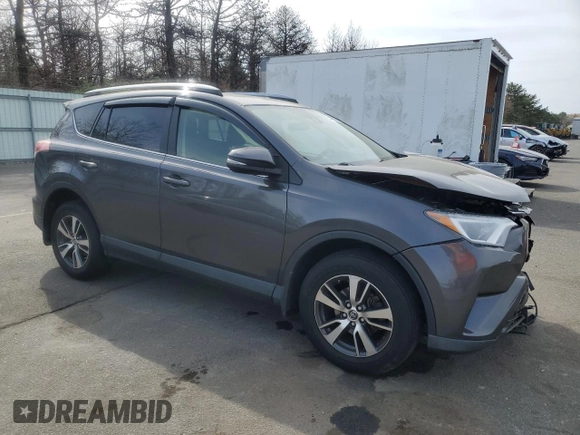 2018 Toyota RAV4 XLE with VIN JTMRFREV5JJ739973, listed as a Copart auction lot 54490225 with 65,807 mi miles and Salvage Title. Bid and sale history available at DreamBid. Image 4.