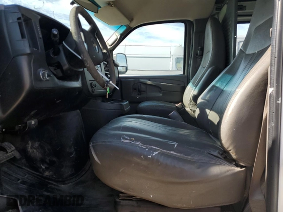 2014 Chevrolet Express Cargo Van with VIN 1GCWGGBA3E1213546, listed as a Copart auction lot 77206984 with 309,311 mi miles and Clean Title. Bid and sale history available at carsss.com. Image 7.