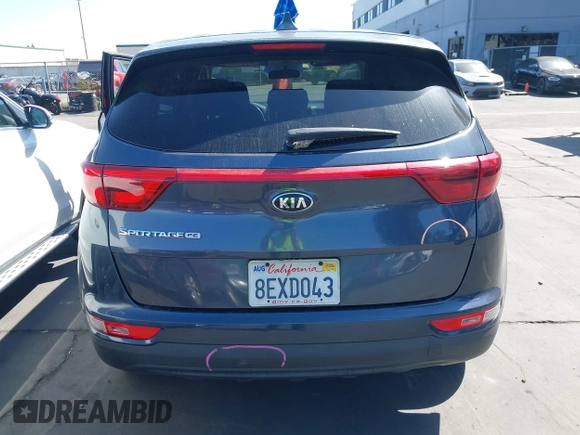 2019 Kia Sportage LX with VIN KNDPM3ACXK7513831, listed as a IAAI auction lot 41969252 with 99,388 mi miles. Bid and sale history available at carsss.com. Image 17.