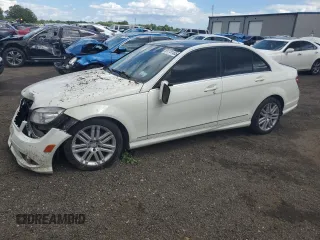 2009 Mercedes-Benz C 300 Sport with VIN WDDGF81X99R070263, listed as a Copart auction lot 61741465 with 121,762 mi miles and Salvage title. Bid and sale history available at DreamBid. Image 1.