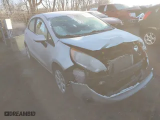 2013 Kia Rio LX with VIN KNADM5A34D6274278, listed as a IAAI auction lot 41810478 with 89,723 mi miles. Bid and sale history available at carsss.com. Image 1.