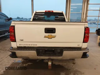 2014 Chevrolet Silverado 1500 LT with VIN 1GCVKREC3EZ106310, listed as a IAAI auction lot 40752259 with 162,397 mi miles and . Bid and sale history available at DreamBid. Image 17.