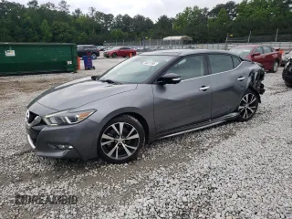 2016 Nissan Maxima S with VIN 1N4AA6AP9GC900863, listed as a Copart auction lot 56287095 with 126,366 mi miles and Salvage title. Bid and sale history available at DreamBid. Image 1.