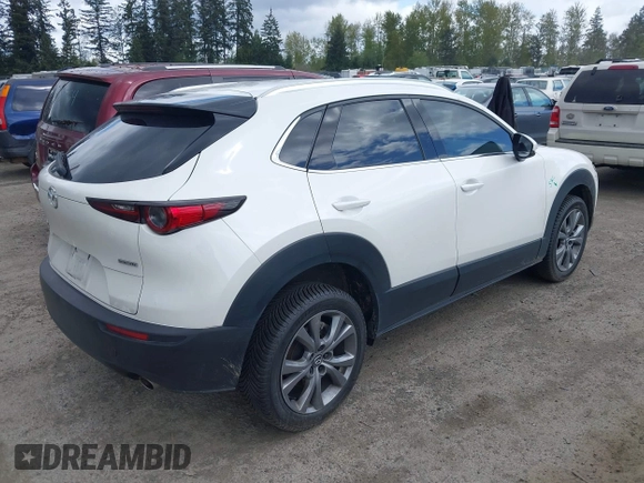 2023 Mazda CX-30 2.5 S Premium Package with VIN 3MVDMBDM7PM522287, listed as a IAAI auction lot 42052660 with 41,336 mi miles. Bid and sale history available at carsss.com. Image 4.