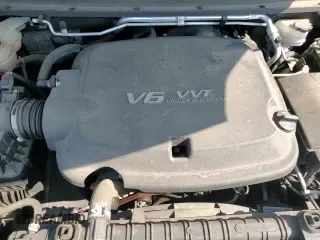 2018 Chevrolet Colorado 4WD Work Truck z VIN 1GCGTBEN0J1193459, wystawiony jako Copart lot #71518455 z przebiegiem 69 537 mil mil oraz Szkoda całkowita • Salvage title. Historia ofert i sprzedaży dostępna na DreamBid. Obrazek 15.