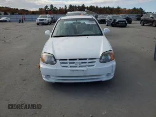 2005 Hyundai Accent GLS with VIN KMHCG45CX5U640554, listed as a Copart auction lot 77653664 with 179,642 mi miles and Clean Title. Bid and sale history available at carsss.com. Image 5.