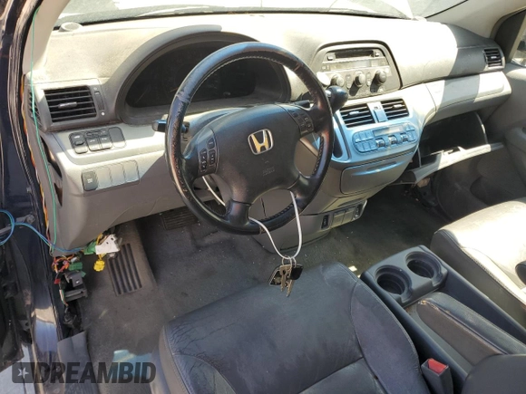 2006 Honda Odyssey EX-L с VIN 5FNRL38696B032304, выставлен на аукционе Copart как лот 59104445 с пробегом Не указан миль и Чистый • Clean title. История ставок и продаж доступна на DreamBid. Изображение 8.