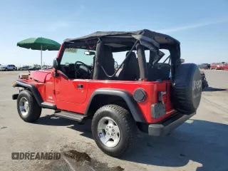 2003 Jeep Wrangler Sport z VIN 1J4FA49S33P302780, wystawiony jako Copart lot #60354805 z przebiegiem 201 679 mil mil oraz Szkoda całkowita • Salvage title. Historia ofert i sprzedaży dostępna na DreamBid. Obrazek 2.