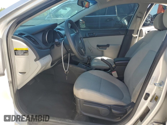 2010 Kia Forte LX with VIN KNAFT4A23A5107621, listed as a Copart auction lot 53696985 with 124,833 mi miles and Salvage Title. Bid and sale history available at carsss.com. Image 7.