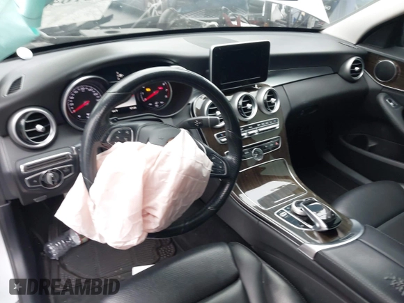 2015 Mercedes-Benz C 300 with VIN 55SWF4JB1FU077386, listed as a IAAI auction lot 42164280 with 104,452 mi miles and . Bid and sale history available at carsss.com. Image 21.