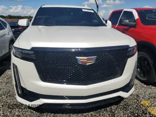 2021 Cadillac Escalade Sport z VIN 1GYS3EKL1MR270077, wystawiony jako Copart lot #74130854 z przebiegiem 21 584 mil mil oraz Szkoda całkowita • Salvage title. Historia ofert i sprzedaży dostępna na DreamBid. Obrazek 5.