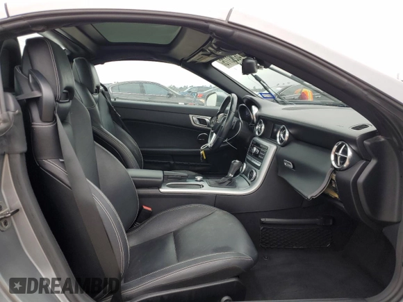 2014 Mercedes-Benz SLK 250 with VIN WDDPK4HA0EF091357, listed as a Copart auction lot 46293775 with 71,994 mi miles and Salvage title. Bid and sale history available at DreamBid. Image 10.