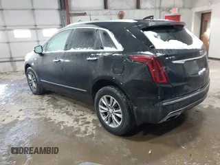 2021 Cadillac XT5 FWD Premium Luxury with VIN 1GYKNCRS3MZ198651, listed as a IAAI auction lot 41607734 with 49,275 mi miles. Bid and sale history available at carsss.com. Image 3.