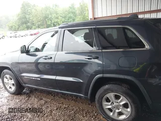 2014 Jeep Grand Cherokee Laredo with VIN 1C4RJEAG6EC206748, listed as a IAAI auction lot 42244421 with 198,217 mi miles and . Bid and sale history available at DreamBid. Image 14.