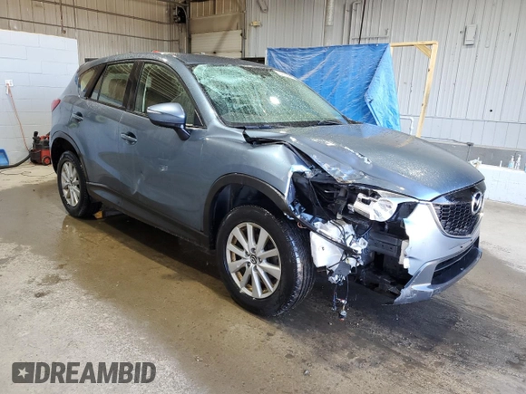 2015 Mazda CX-5 Sport with VIN JM3KE4BY9F0552942, listed as a Copart auction lot 54750245 with 129,700 mi miles and Salvage title. Bid and sale history available at DreamBid. Image 4.