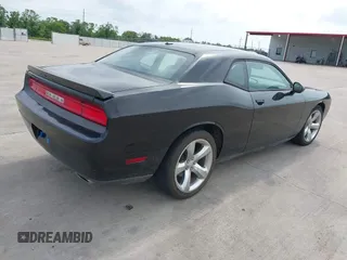 2012 Dodge Challenger SXT Plus z VIN 2C3CDYAG2CH281069, wystawiony jako IAAI lot #42314949 z przebiegiem 167 592 mil mil oraz . Historia ofert i sprzedaży dostępna na DreamBid. Obrazek 4.