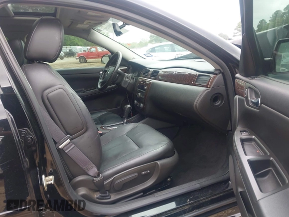 2014 Chevrolet Impala LTZ with VIN 2G1WC5E36E1138809, listed as a IAAI auction lot 41961255 with 119,222 mi miles and . Bid and sale history available at DreamBid. Image 5.