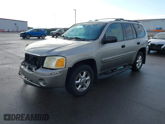 2003 GMC Envoy SLT with VIN 1GKDT13S532308502, listed as a IAAI auction lot 41676188 with 218,626 mi miles. Bid and sale history available at carsss.com. Image 2.