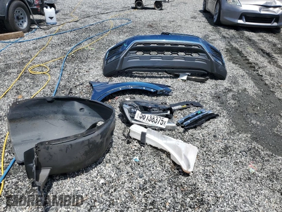 2018 Volkswagen Tiguan S with VIN 3VV0B7AX2JM019924, listed as a Copart auction lot 56138375 with 76,798 mi miles and Salvage title. Bid and sale history available at DreamBid. Image 12.