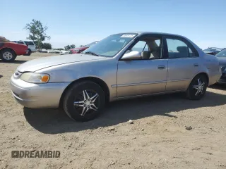 1998 Toyota Corolla VE with VIN 1NXBR18E6WZ080700, listed as a Copart auction lot 58605135 with 214,928 mi miles and Salvage title. Bid and sale history available at DreamBid. Image 1.