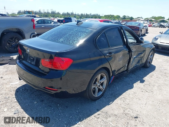 2015 BMW 3 Series 328i with VIN WBA3C1C58FK123489, listed as a IAAI auction lot 42026400 with 127,880 mi miles and . Bid and sale history available at carsss.com. Image 4.