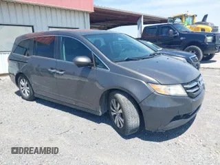 2014 Honda Odyssey EX-L with VIN 5FNRL5H6XEB111412, listed as a IAAI auction lot 41917361 with 210,841 mi miles and . Bid and sale history available at carsss.com. Image 1.