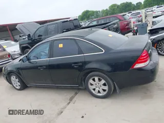 2007 Mercury Montego z VIN 1MEHM401X7G610172, wystawiony jako IAAI lot #41933589 z przebiegiem Nie podano mil oraz . Historia ofert i sprzedaży dostępna na DreamBid. Obrazek 14.