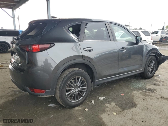 2020 Mazda CX-5 Touring with VIN JM3KFACM6L0797748, listed as a Copart auction lot 44573645 with 104,094 mi miles and Salvage Title. Bid and sale history available at carsss.com. Image 3.