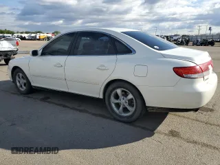 2006 Hyundai Azera SE with VIN KMHFC46F96A072558, listed as a Copart auction lot 57644625 with 156,743 mi miles and Salvage title. Bid and sale history available at DreamBid. Image 2.