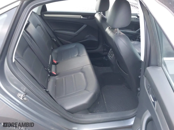 2014 Volkswagen Passat SE w/Sunroof with VIN 1VWBS7A32EC057808, listed as a IAAI auction lot 41208311 with 91,362 mi miles. Bid and sale history available at carsss.com. Image 8.