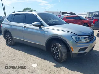 2020 Volkswagen Tiguan SE with VIN 3VV3B7AX8LM077472, listed as a IAAI auction lot 41933521 with 52,028 mi miles and . Bid and sale history available at DreamBid. Image 1.