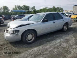 2001 Mercury Grand Marquis LS z VIN 2MEFM75W31X704781, wystawiony jako Copart lot #54613735 z przebiegiem 191 323 mil mil oraz Szkody całkowita. Historia ofert i sprzedaży dostępna na DreamBid. Obrazek 1.