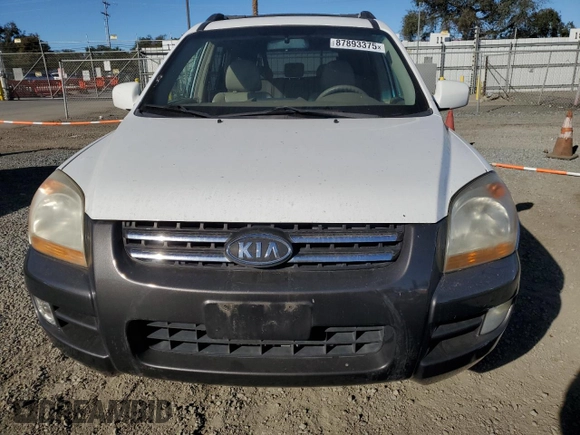 2005 Kia Sportage LX with VIN KNDJF723857134398, listed as a Copart auction lot 87893375 with 186,405 mi miles and Salvage Title. Bid and sale history available at carsss.com. Image 5.