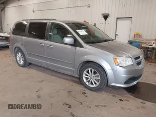 2014 Dodge Grand Caravan SXT with VIN 2C4RDGCG9ER213426, listed as a IAAI auction lot 41044553 with 175,140 mi miles and . Bid and sale history available at DreamBid. Image 1.