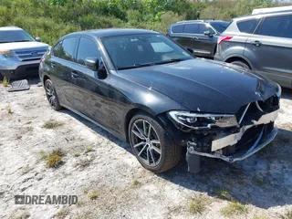 2019 BMW 3 Series 330i xDrive with VIN WBA5R7C51KFH25487, listed as a IAAI auction lot 40605403 with 1 mi miles. Bid and sale history available at carsss.com. Image 1.