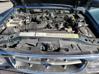 1997 Ford Explorer XL with VIN 1FMDU34E2VZC03015, listed as a Copart auction lot 80654764 with 295,587 mi miles and Salvage title. Bid and sale history available at DreamBid. Image 11.
