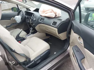 2014 Honda Civic LX z VIN 2HGFB2F53EH512715, wystawiony jako IAAI lot #42300257 z przebiegiem 77 609 mil mil oraz . Historia ofert i sprzedaży dostępna na DreamBid. Obrazek 5.