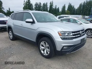 2019 Volkswagen Atlas SE z VIN 1V2UR2CA7KC559844, wystawiony jako IAAI lot #42488061 z przebiegiem 98 241 mil mil oraz . Historia ofert i sprzedaży dostępna na DreamBid. Obrazek 1.