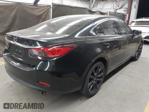 2014 Mazda Mazda6 i Touring with VIN JM1GJ1T67E1125290, listed as a IAAI auction lot 42041112 with 114,875 mi miles. Bid and sale history available at carsss.com. Image 4.