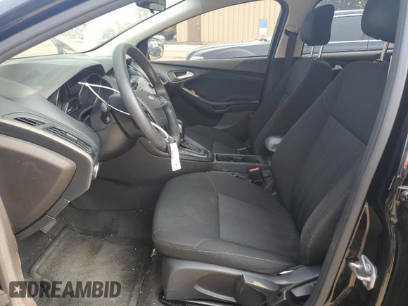 2018 Ford Focus SE z VIN 1FADP3F2XJL228407, wystawiony jako Copart lot #59254415 z przebiegiem 75 241 mil mil oraz Szkoda całkowita • Salvage title. Historia ofert i sprzedaży dostępna na DreamBid. Obrazek 7.