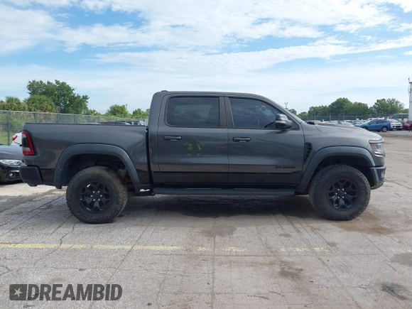 2021 Ram 1500 TRX with VIN 1C6SRFU98MN820577, listed as a IAAI auction lot 42652005 with 43,429 mi miles and . Bid and sale history available at DreamBid. Image 13.